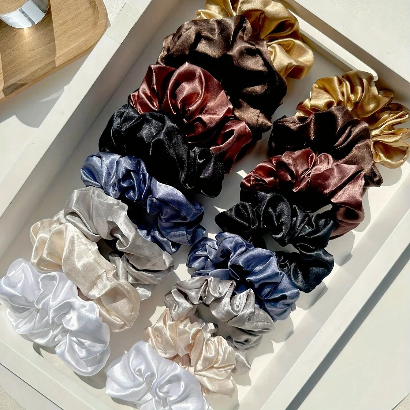 16-piece set of soft satin hair ties in pink and brown colors