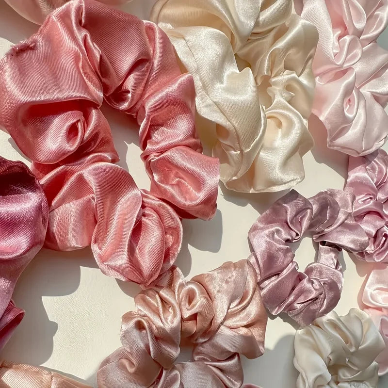 16-piece set of soft satin hair ties in pink and brown colors